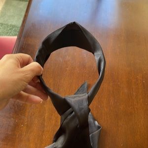 Black silk headband w attached scarf.